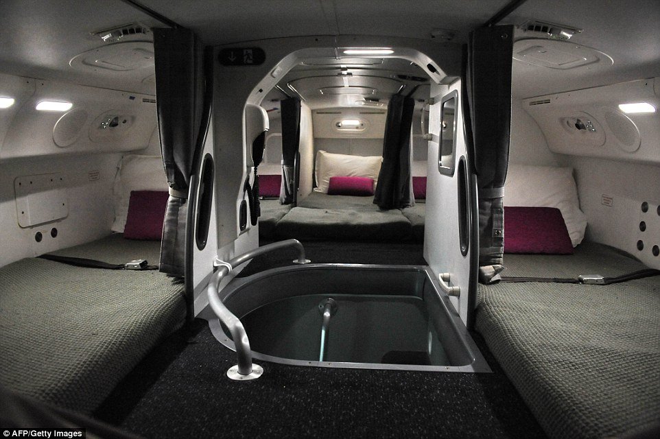 Inside the Crew Rest Compartments where flight attendants and pilots sleep | Daily Mail Online