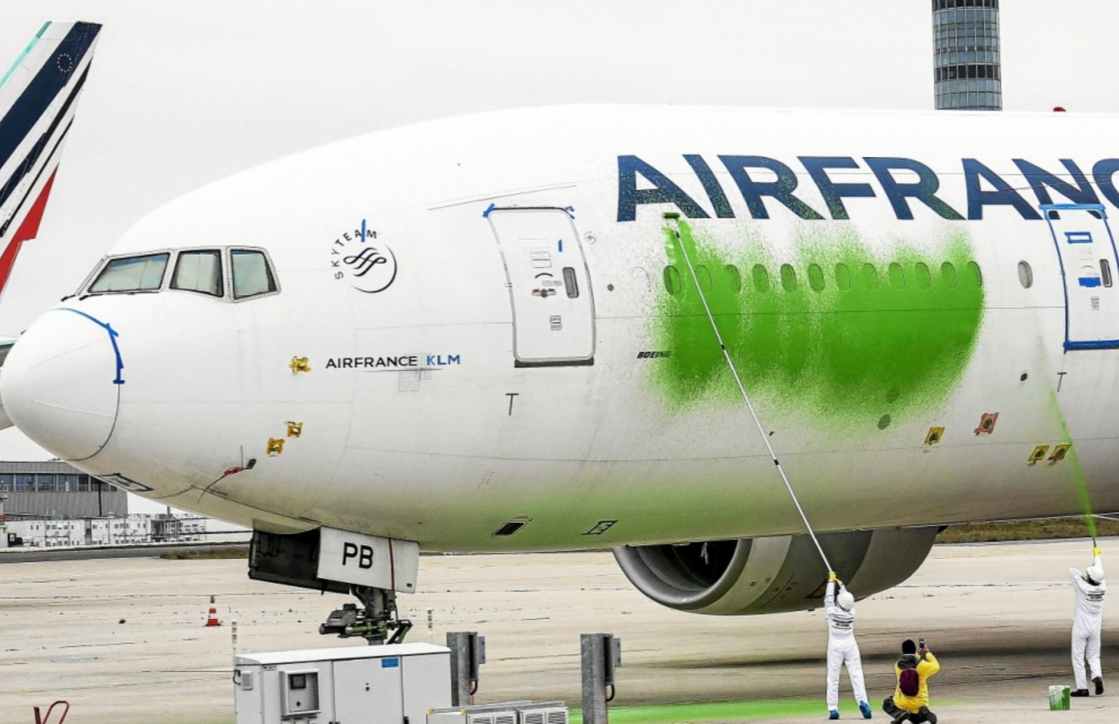 Why Environmental Activists Broke Into Paris Airport and Painted a Plane Green