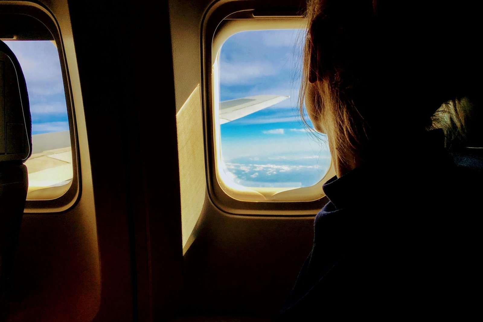 person riding on a plane